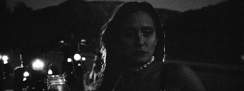 Movie still from “Jesse Jo Stark - So Bad” (2022), directed by Ramez Silyan – Close Up shot, Low angle