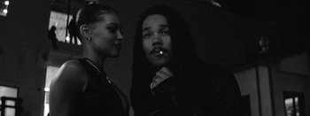 Movie still from “Jesse Jo Stark - So Bad” (2022), directed by Ramez Silyan – Close Up shot, Over the shoulder angle