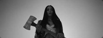 Movie still from “Jesse Jo Stark - So Bad” (2022), directed by Ramez Silyan – Close Up shot, Low angle