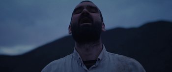 Movie still from “Röyksopp - Profound Mysteries” (2022), directed by Martin De Thurah – Close Up shot, Low angle