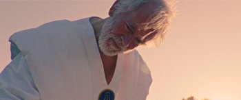 Movie still from “Röyksopp - Profound Mysteries” (2022), directed by Martin De Thurah – Close Up shot, Low angle