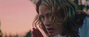 Movie still from “Röyksopp - Profound Mysteries” (2022), directed by Martin De Thurah – Close Up shot, Low angle