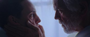 Movie still from “Röyksopp - Profound Mysteries” (2022), directed by Martin De Thurah – Extreme Close Up shot, Over the shoulder angle