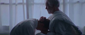 Movie still from “Röyksopp - Profound Mysteries” (2022), directed by Martin De Thurah – Close Up shot, Low angle