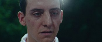 Movie still from “Röyksopp - Profound Mysteries” (2022), directed by Martin De Thurah – Close Up shot, Low angle