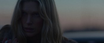 Movie still from “Röyksopp - Profound Mysteries” (2022), directed by Martin De Thurah – Close Up shot, Low angle