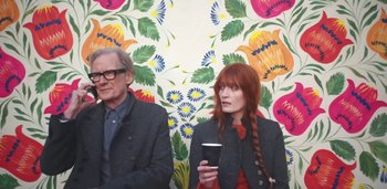 Movie still from “Florence + The Machine - Free” (2022), directed by Autumn de Wilde – Medium shot, Low angle