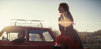 Movie still from “Florence + The Machine - Free” (2022), directed by Autumn de Wilde – Medium shot, Low angle