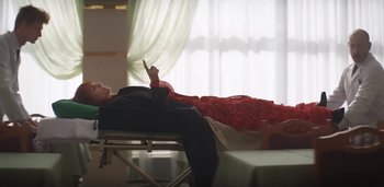 Movie still from “Florence + The Machine - Free” (2022), directed by Autumn de Wilde – Medium shot, Low angle