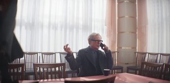 Movie still from “Florence + The Machine - Free” (2022), directed by Autumn de Wilde – Medium shot, Low angle