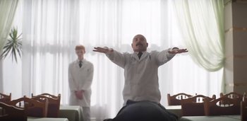 Movie still from “Florence + The Machine - Free” (2022), directed by Autumn de Wilde – Wide shot, Low angle