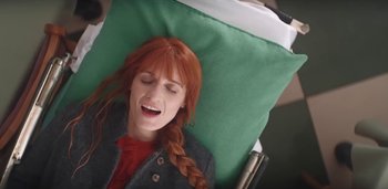 Movie still from “Florence + The Machine - Free” (2022), directed by Autumn de Wilde – Close Up shot, Overhead angle