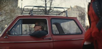 Movie still from “Florence + The Machine - Free” (2022), directed by Autumn de Wilde – Medium shot, Low angle