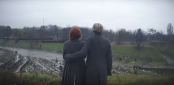 Movie still from “Florence + The Machine - Free” (2022), directed by Autumn de Wilde – Medium shot, Low angle