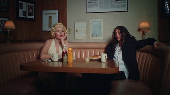 Movie still from “070 Shake - Skin & Bones” (2022), directed by Noah Lee – Medium shot, High angle