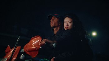 Movie still from “070 Shake - Skin & Bones” (2022), directed by Noah Lee – Medium shot, Low angle