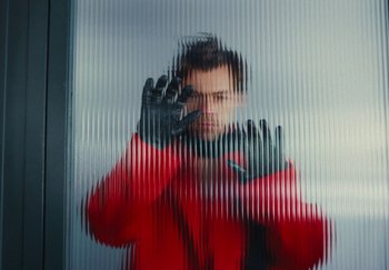 Movie still from “Harry Styles - As It Was” (2022), directed by Tanu Muiño – Extreme Close Up shot, Overhead angle