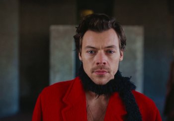 Movie still from “Harry Styles - As It Was” (2022), directed by Tanu Muiño – Close Up shot, High angle