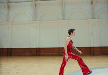 Movie still from “Harry Styles - As It Was” (2022), directed by Tanu Muiño – Extreme Wide shot, Low angle