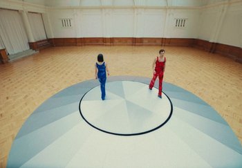 Movie still from “Harry Styles - As It Was” (2022), directed by Tanu Muiño – Wide shot, High angle