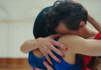 Movie still from “Harry Styles - As It Was” (2022), directed by Tanu Muiño – Close Up shot, Over the shoulder angle