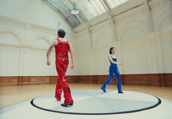 Movie still from “Harry Styles - As It Was” (2022), directed by Tanu Muiño – Wide shot, Low angle