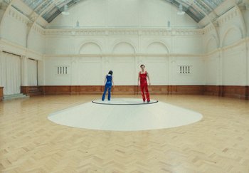 Movie still from “Harry Styles - As It Was” (2022), directed by Tanu Muiño – Wide shot, High angle