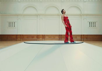 Movie still from “Harry Styles - As It Was” (2022), directed by Tanu Muiño – Wide shot, Low angle