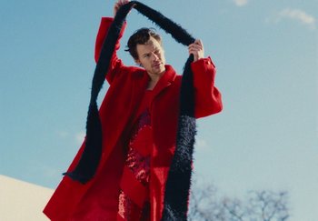 Movie still from “Harry Styles - As It Was” (2022), directed by Tanu Muiño – Medium shot, Low angle