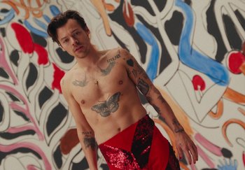 Movie still from “Harry Styles - As It Was” (2022), directed by Tanu Muiño – Medium shot, High angle