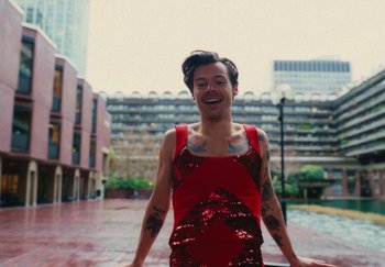 Movie still from “Harry Styles - As It Was” (2022), directed by Tanu Muiño – Medium shot, High angle