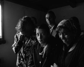 Movie still from “ZNTNDR - Wonderful Time” (2022), directed by Jovan Todorović – Medium shot, High angle