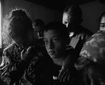 Movie still from “ZNTNDR - Wonderful Time” (2022), directed by Jovan Todorović – Close Up shot, High angle