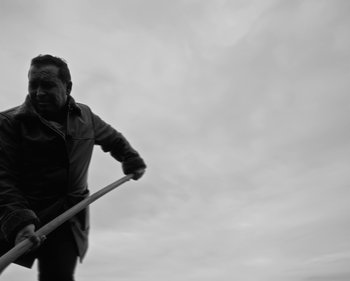 Movie still from “ZNTNDR - Wonderful Time” (2022), directed by Jovan Todorović – Medium shot, Low angle