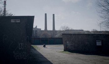 Movie still from “Anima Sound System - Dress Me In White” (2022), directed by Luka Kostil – Extreme Wide shot, High angle