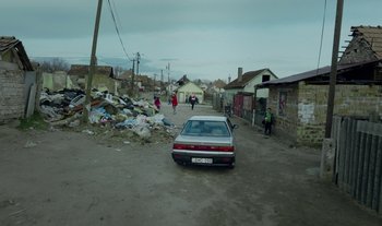 Movie still from “Anima Sound System - Dress Me In White” (2022), directed by Luka Kostil – Extreme Wide shot, High angle