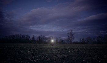 Movie still from “Anima Sound System - Dress Me In White” (2022), directed by Luka Kostil – Extreme Wide shot, High angle