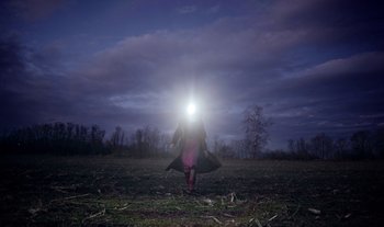 Movie still from “Anima Sound System - Dress Me In White” (2022), directed by Luka Kostil – Extreme Wide shot, Low angle