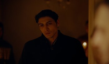 Movie still from “Anima Sound System - Dress Me In White” (2022), directed by Luka Kostil – Close Up shot, High angle