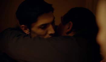 Movie still from “Anima Sound System - Dress Me In White” (2022), directed by Luka Kostil – Close Up shot, Over the shoulder angle