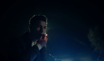 Movie still from “Anima Sound System - Dress Me In White” (2022), directed by Luka Kostil – Close Up shot, Low angle