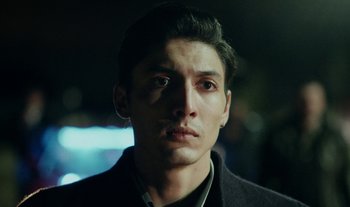 Movie still from “Anima Sound System - Dress Me In White” (2022), directed by Luka Kostil – Close Up shot, Low angle