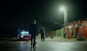 Movie still from “Anima Sound System - Dress Me In White” (2022), directed by Luka Kostil – Wide shot, Low angle