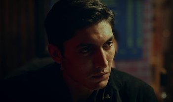 Movie still from “Anima Sound System - Dress Me In White” (2022), directed by Luka Kostil – Close Up shot, Low angle