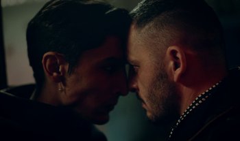 Movie still from “Anima Sound System - Dress Me In White” (2022), directed by Luka Kostil – Close Up shot, Over the shoulder angle