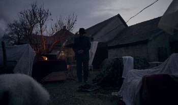 Movie still from “Anima Sound System - Dress Me In White” (2022), directed by Luka Kostil – Wide shot, High angle