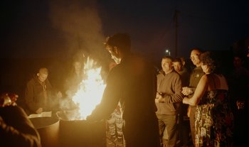 Movie still from “Anima Sound System - Dress Me In White” (2022), directed by Luka Kostil – Medium shot, Over the shoulder angle