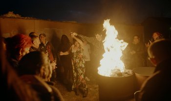 Movie still from “Anima Sound System - Dress Me In White” (2022), directed by Luka Kostil – Wide shot, Over the shoulder angle