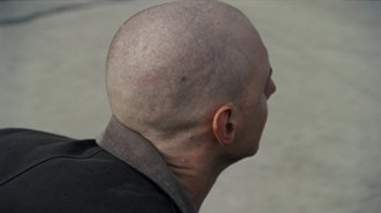 Movie still from “Pendant - Static Dream” (2022), directed by Ramez Silyan – Close Up shot, High angle