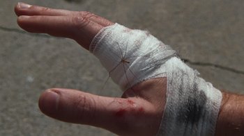 Movie still from “Pendant - Static Dream” (2022), directed by Ramez Silyan – Extreme Close Up shot, High angle